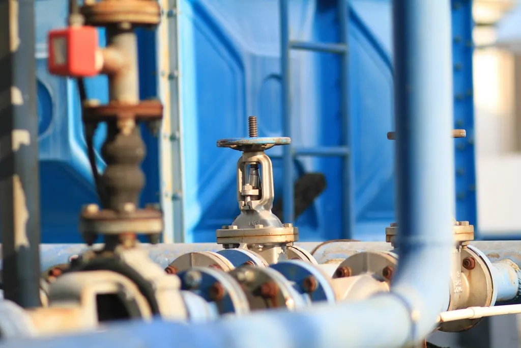 Close-up of pipes and valves on an industrial manifold